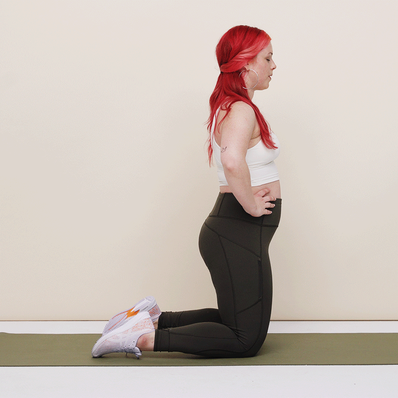 Nikki doing a bodyweight leg extension